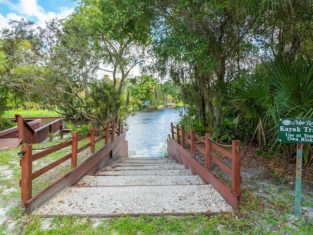 dock area featuring a water view