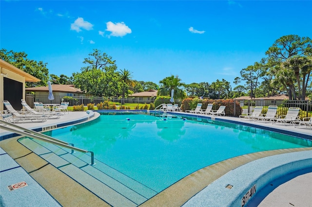 view of swimming pool with a patio area