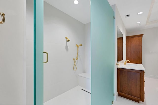 bathroom with vanity and an enclosed shower