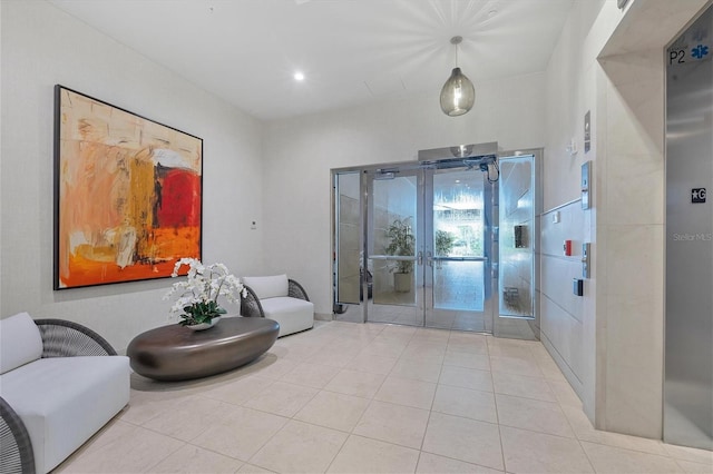 interior space featuring light tile patterned floors and elevator