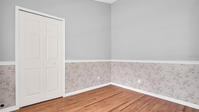 unfurnished bedroom featuring hardwood / wood-style floors