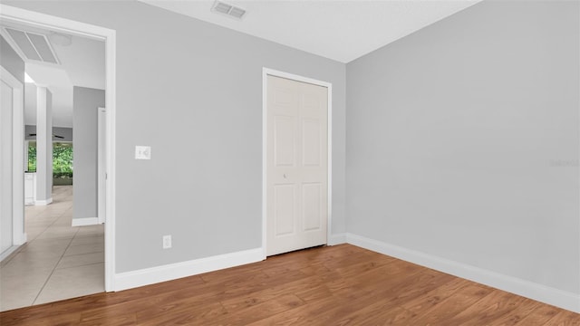 unfurnished bedroom with light hardwood / wood-style flooring