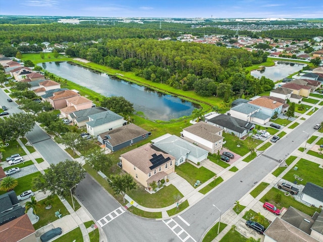 drone / aerial view with a water view