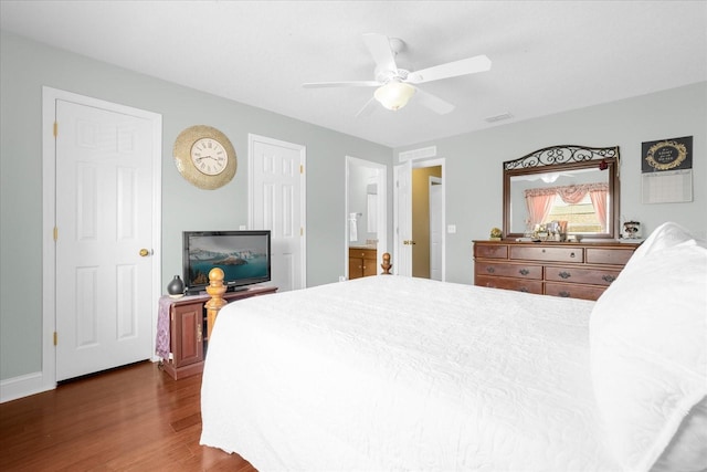 bedroom featuring dark hardwood / wood-style floors and ceiling fan