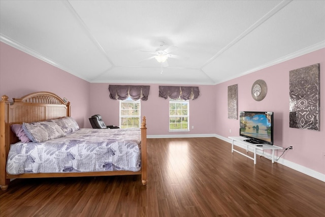 bedroom featuring ceiling fan, ornamental molding, wood-type flooring, and lofted ceiling