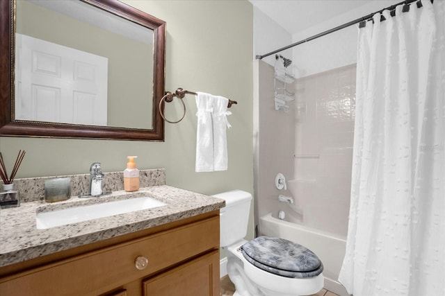 full bathroom with shower / tub combo, vanity, and toilet