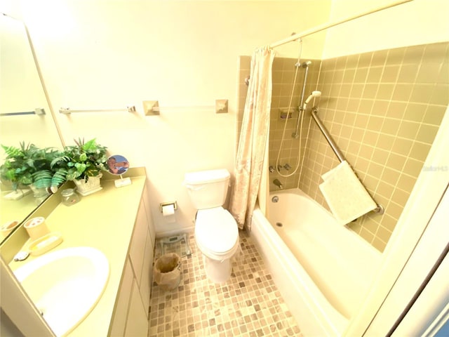 full bathroom featuring tile patterned floors, vanity, toilet, and shower / tub combo