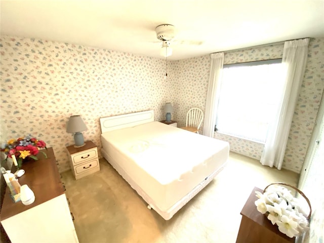 bedroom with light colored carpet