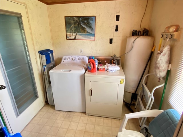 laundry room featuring washing machine and dryer