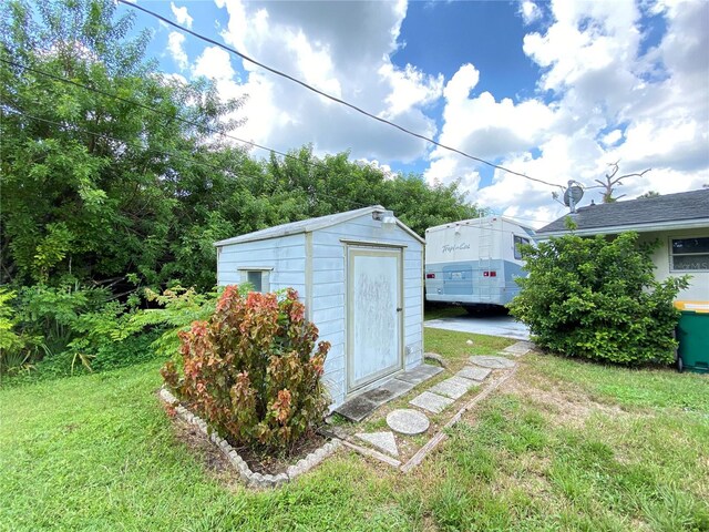 2434 Fourwind St, Port Charlotte, FL 33948 - view of outbuilding featuring a yard