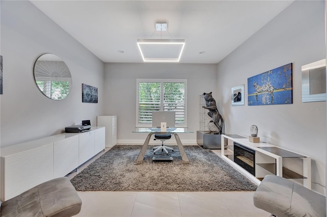 home office with tile patterned floors