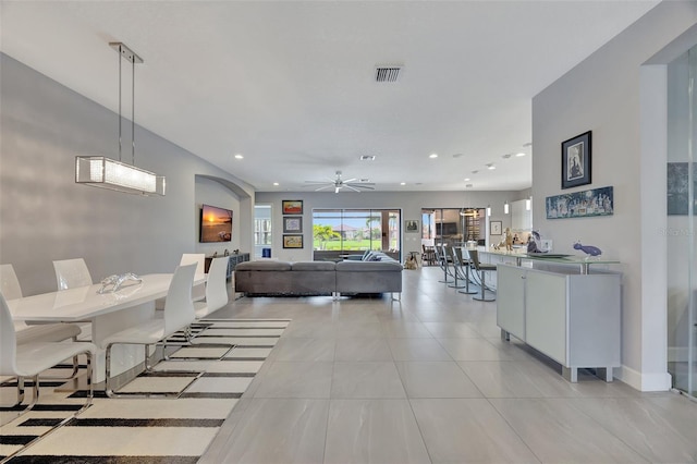 interior space featuring ceiling fan