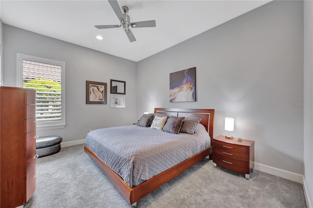 carpeted bedroom with ceiling fan