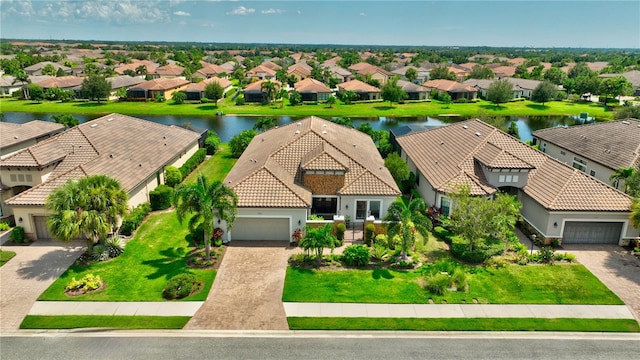 bird's eye view with a water view