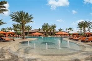 view of swimming pool featuring pool water feature