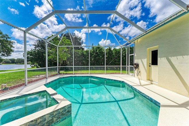 view of swimming pool featuring a patio area, an in ground hot tub, glass enclosure, and a water view