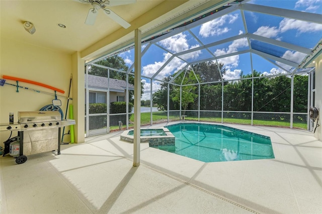 view of pool featuring a patio area, glass enclosure, an in ground hot tub, and area for grilling