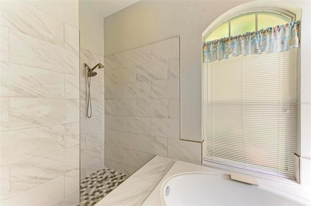 bathroom with plus walk in shower