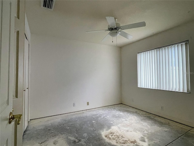 unfurnished room featuring ceiling fan