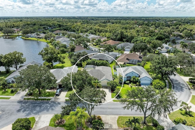 bird's eye view with a water view