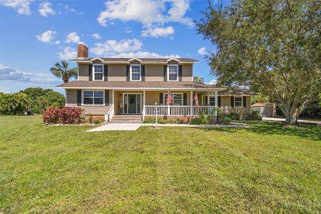 view of front facade featuring a front yard and a porch