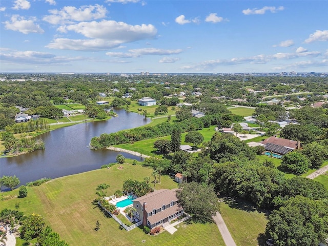 drone / aerial view with a water view