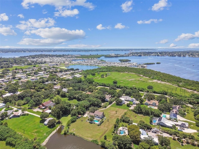 birds eye view of property featuring a water view