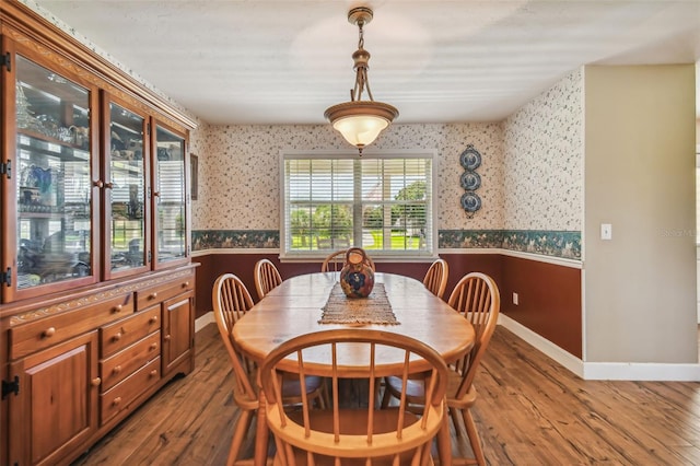 dining area with hardwood / wood-style flooring