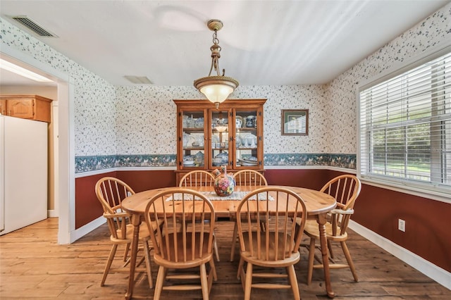 dining room featuring light wood-type flooring