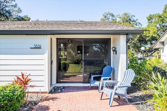 property entrance featuring a patio