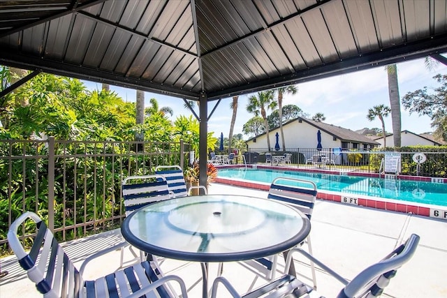 view of pool with a gazebo and a patio area