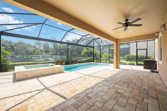 view of pool featuring ceiling fan, a patio area, and a lanai