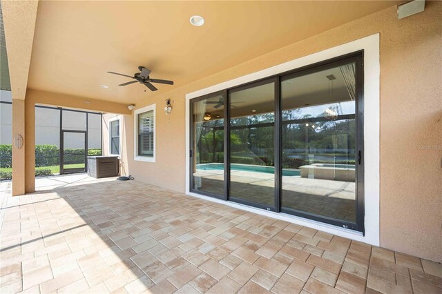 view of patio with ceiling fan