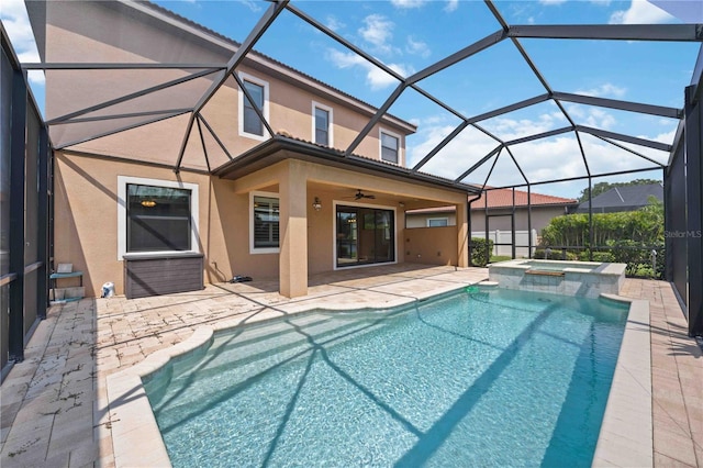 view of pool featuring ceiling fan, a lanai, an in ground hot tub, and a patio