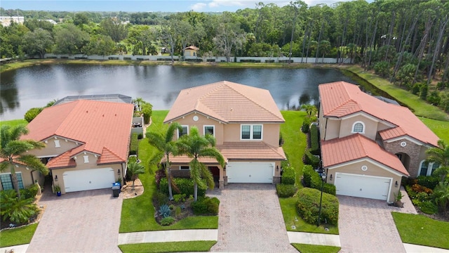 bird's eye view with a water view