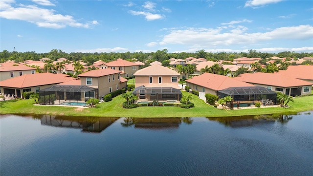 drone / aerial view with a water view