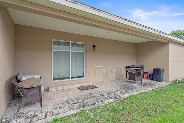 rear view of house featuring a patio