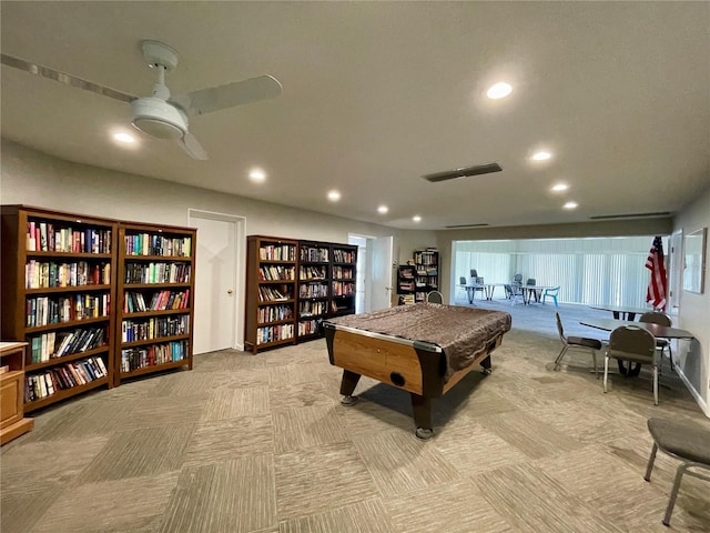 playroom featuring ceiling fan, billiards, and light carpet