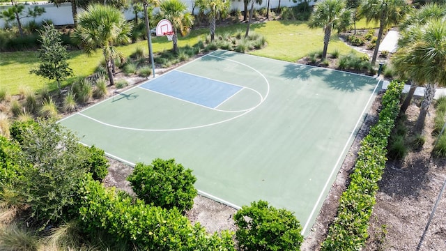 view of sport court with community basketball court and a lawn