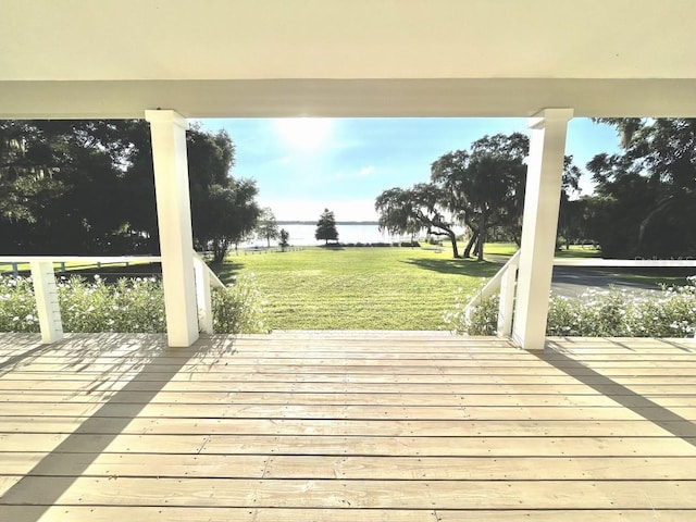 wooden deck with a yard