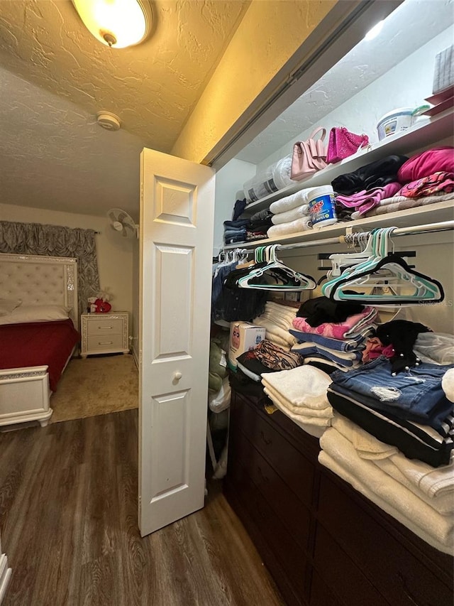 spacious closet featuring hardwood / wood-style floors