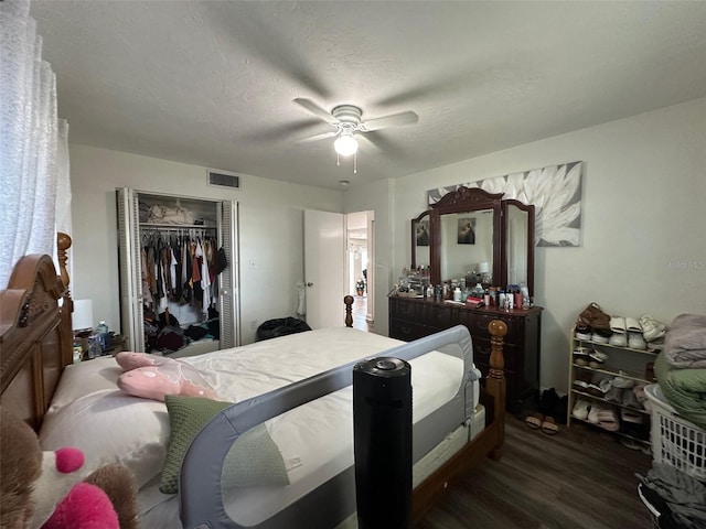 bedroom featuring ceiling fan, hardwood / wood-style flooring, and a closet