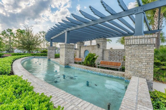 view of pool with a pergola