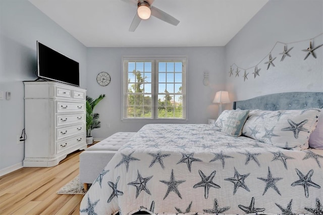 bedroom featuring ceiling fan and light hardwood / wood-style flooring