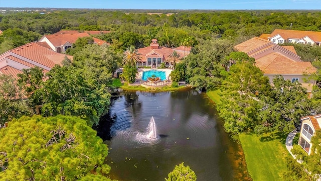 drone / aerial view with a water view