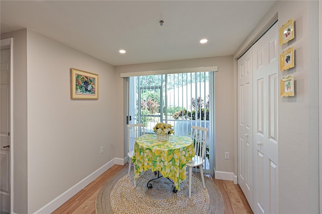 dining space featuring light wood-type flooring