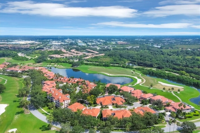 aerial view featuring view of golf course, a water view, and a residential view