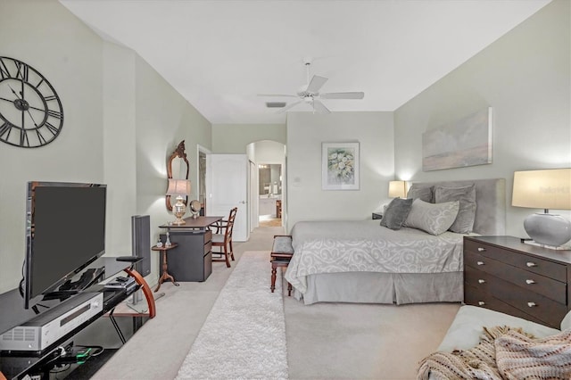 bedroom featuring ceiling fan and light carpet