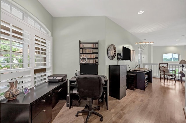 office area with light hardwood / wood-style floors