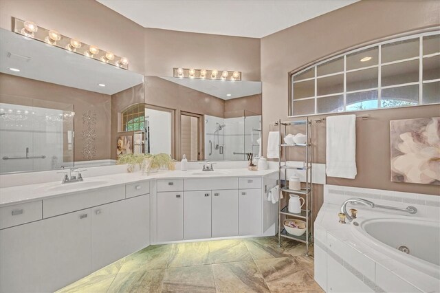 bathroom featuring tile patterned flooring, plus walk in shower, and dual vanity